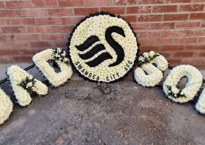 Dad and Son letters and a Swans badge