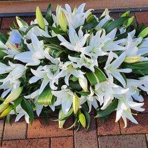 All Lily Casket Spray